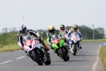 PACEMAKER PRESS BELFAST 11/08/12: Michael Dunlop on his McAdoo Kawasaki leads Ian Lougher, Guy Martin and Bruce Anstey at the hairpin during the Superstock race at the 2012 Ulster Grand Prix PHOTO BY SIMON PATTERSON/PACEMAKER