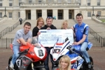William Dunlop, Bruce Anstey, Conor Cummins and Ulster Grand Prix girl April Linton with Anne McRoberts and Heather Miller from Marie Curie Cancer Care at the launch of the 90th McKinstry Skip Hire Ulster Grand Prix at Parliament Buildings