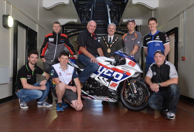 Road racing stars take no prisoners at 2015 Metzeler Ulster Grand Prix launch Some of the biggest names in real road racing have gathered in the historic setting of Belfast’s Crumlin Road Gaol to officially launch the 2015 Metzeler Ulster Grand Prix.  An all-star line up including Ian Hutchinson, Glenn Irwin, Dean Harrison, Dan Kneen, Peter Hickman and Paul Owen were placed on ‘parole’ as they gave fans an exciting preview of what’s in store during Bike Week and discussed their seasons so far.  Pictured is (back row, l-r): Ian Hutchinson, Noel Johnston, Clerk of the Course at the Metzeler Ulster Grand Prix, Cllr Thomas Beckett, Mayor of Lisburn & Castlereagh City Council, Peter Hickman and Dean Harrison.  (Front row l-r): Glenn Irwin, Dan Kneen and Paul Owen.