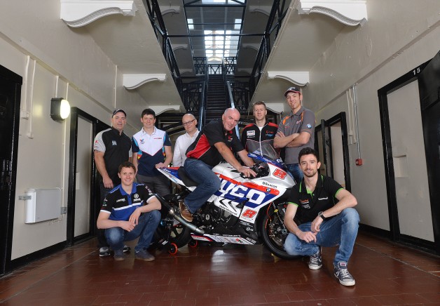 Road racing stars take no prisoners at 2015 Metzeler Ulster Grand Prix launch   Some of the biggest names in real road racing have gathered in the historic setting of Belfast’s Crumlin Road Gaol to officially launch the 2015 Metzeler Ulster Grand Prix.    An all-star line up including Ian Hutchinson, Glenn Irwin, Dean Harrison, Dan Kneen, Peter Hickman and Paul Owen were placed on ‘parole’ as they gave fans an exciting preview of what’s in store during Bike Week and discussed their seasons so far.    Pictured is (back row, l-r): Paul Owen, Dan Kneen, Simon Carter, Metzeler UK Marketing Manager, Noel Johnston, Clerk of the Course at the Metzeler Ulster Grand Prix, Ian Hutchinson and Peter Hickman.  (Front row l-r) Dean Harrison and Glenn Irwin.  Ian Hutchinson, Noel Johnston, Clerk of the Course at the Metzeler Ulster Grand Prix, Cllr Thomas Beckett, Mayor of Lisburn & Castlereagh City Council, Peter Hickman and Dean Harrison.  (Front row l-r): Glenn Irwin, Dan Kneen and Paul Owen.