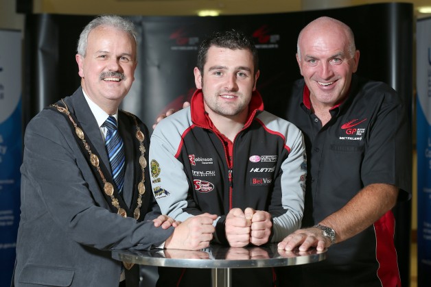 Michael Dunlop is confident he can end his season on a high and add to his tally of six wins at Dundrod circuit, as he looks forward to next weekÕs Metzeler Ulster Grand Prix. Pictured is Michael with Councillor Thomas Beckett, Mayor of Lisburn and Castlereagh City Council and Noel Johnston, Clerk of the Course at the Metzeler Ulster Grand Prix.