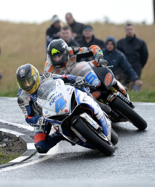 17/08/2013 PACEMAKER PRESS INTL. Guy Martin takes victory from Bruce Ansty in the Supersport race at The Ulster Grand Prix this afternoon. Picture Charles McQuillan/Pacemaker