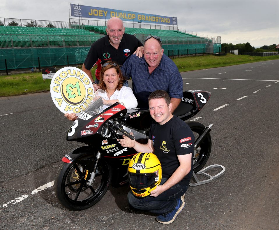 Gary Dunlop pictured ahead of his debut at the MCE Ulster Grand Prix along with Noel Johnston, Clerk of the Course and race sponsors Siobhan and Gerard Rice of Around A Pound.
