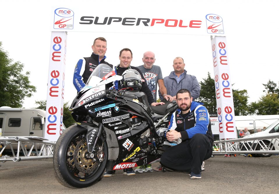 PACEMAKER, BELFAST, 12/8/2016: Michael Dunlop, who will start at Number One on his Hawk BMW in the rescheduled Superpole session which will take place on Saturday morning of MCE Ulster Grand Prix race day, is joined by Clerk of the Course, Noel Johnston and sponsors Darren and Mark McKinstry of McKinstry Skip Hire and James Jamieson of James Jamieson Construction. PICTURE BY STEPHEN DAVISON